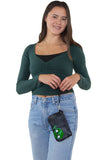 Friendly Alien Wristlet in Vinyl, wristlet style on model
