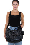 Studded Skull Hobo Bag in Vinyl Material, crossbody style on model