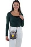 Sleepyville Critters Baby Beaver Holding a Star Shoulder Crossbody Bag in Vinyl Material, crossbody style on model