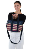 Multi Pocket Vintage Americana Tote Bag in Nylon Material, front view, handheld by model