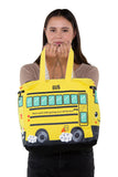 Canvas Yellow Bus Tote Bag, front view, handheld by model