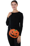 Sleepyville Critters - Pumpkin Two Faced Jack O Lantern Crossbody Bag in Vinyl Material, no glitter side, crossbody style on model