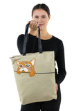 Peeking Tabby Tote Bag in Canvas Material, front view, handheld by model