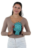 Statue of Liberty Cross Body Bag in Vinyl, front view, handheld by model