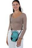 Statue of Liberty Cross Body Bag in Vinyl, crossbody style on model