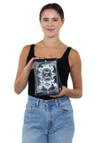 Glow in the Dark Book of Spells Crossbody Bag in Vinyl Material, front view, handheld by model