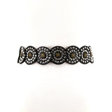 Round Disc Metallic Vinyl Belt in black; back view