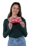 Officially Licensed Coca-Cola Drinks Wallet in Vinyl Material, handheld by model