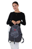 Officially Licensed Coca-Cola Classic Nylon Backpack, front view, handheld by model