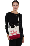 Coca-Cola Small Handheld Bag, crossbody style on model