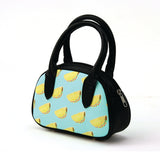 Taco Satchel in Vinyl Material side view