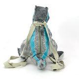 GREY DINO PLUSHY BACKPACK IN POLYESTER
