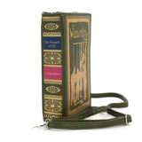 Book-shaped handbag inspired by 'The Wizard of Oz' with a strap on a white background