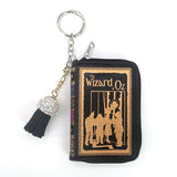 THE WIZARD OF OZ BOOK BAG CHARM/COIN PURSE IN VINYL