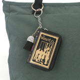 THE WIZARD OF OZ BOOK BAG CHARM/COIN PURSE IN VINYL