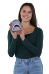 Scary Shark Wristlet with Chained Bloody Hand in Vinyl Material, handheld by model