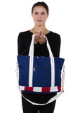 Stars and Stripes USA Flag Canvas Tote Bag, back view, handheld style on model