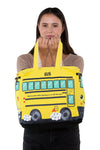 Canvas Yellow Bus Tote Bag, front view, handheld by model