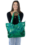 Metallic Mermaid Scales Tote Bag in Polyester Material, green color, front view, handheld by model