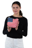 American Flag Crossbody Bag in Canvas with Chain Strap in Canvas Material, front view, handheld by model