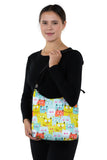 Many Many Cats Messenger Bag in Nylon, shoulder bag style on model