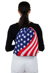 Americana Drawstring Slingbag in Polyester, backpack style on model