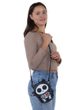 Glow in the Dark Sugar Skull Cat Crossbody Bag in Vinyl, shoulder bag style on model