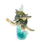 Swimming Mother and Baby Sea Turtles on Blue Waves Figurine; front view