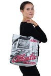 Officially Licensed Coca-Cola Nylon Tote Bag with Pre-1910 Atlanta Print, shoulder bag style on model